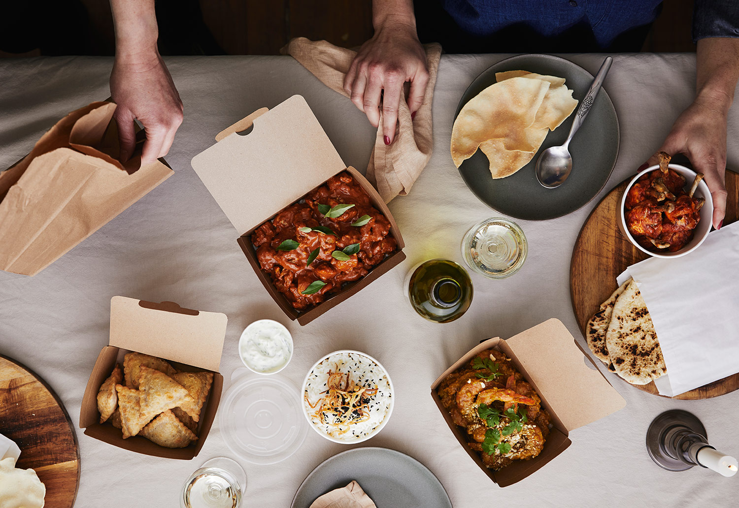 Image of food being shared around a table